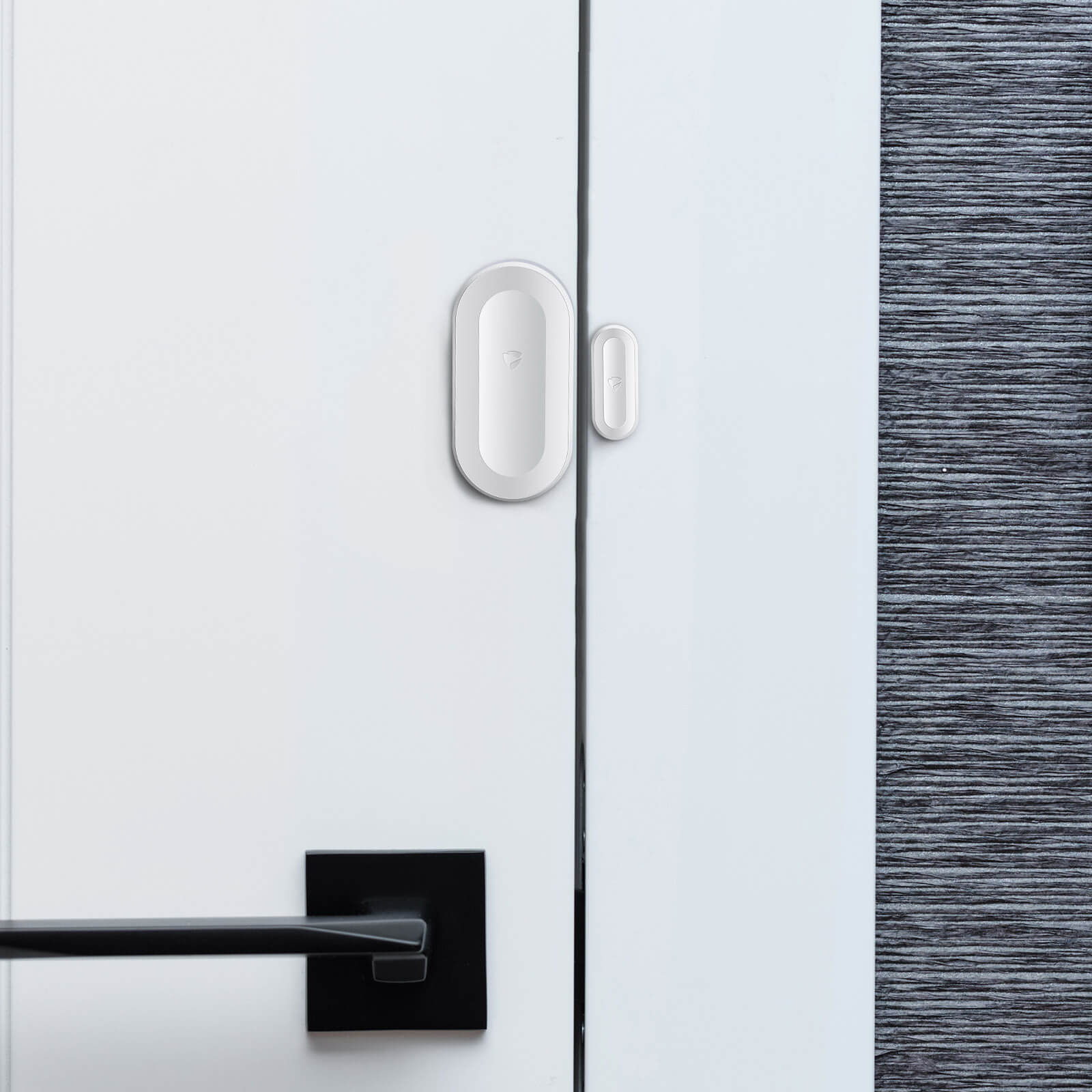 A SECURAM white door handle with a black handle.